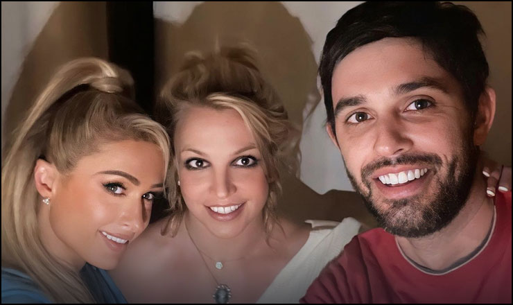 There is a picture of her with Britney and cade Hudson in the middle